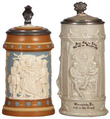 Two Mettlach steins, 1.0L, 202, relief, inlaid lid, faint spider line inside bottom; with, 1.0L, 1005, earlyware, relief, inlaid lid, good handle & inlay repair.