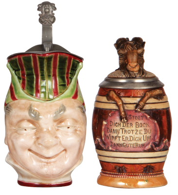 Two Character steins, 1.0L, 9.4" ht., pottery, marked Sarreguemines, Majolica, Man, pewter lid, glaze browning, otherwise mint; with, .5L, pottery, by Diesinger, 700, Bock in Barrel, small chip & line.