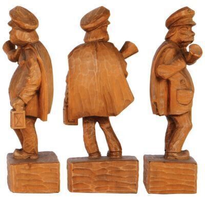 Three Black Forest wood carvings, 14.0" ht. x 6.0" w. x 4.0" deep, Man with Turned up Nose; with, 11.2'' ht., Night Watchman; with, 9.5" ht., Night Watchman, linden wood, made in Germany, mid to late 1900s, all very good quality and condition.        - 3