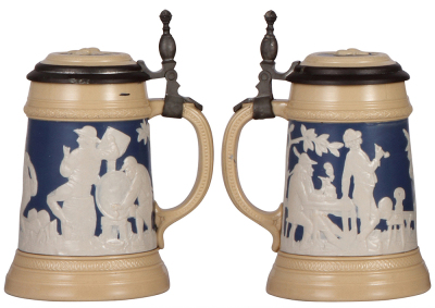 Two Mettlach steins, .5L, 2182, relief, inlaid lid, mint; with, .5L, 2278, relief, by Stahl, pewter lid, mint. - 2
