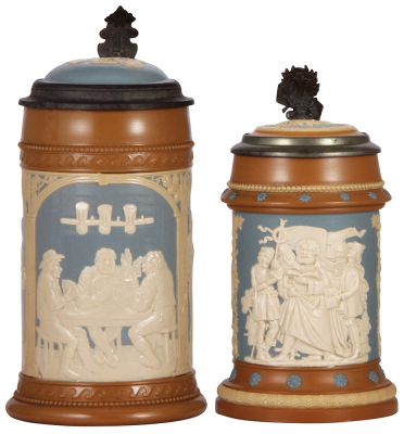 Two Mettlach steins, 1.0L, 2556, relief, inlaid lid, mint; with, .5L, 202, relief, inlaid lid, mint.