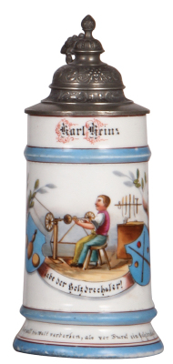 Porcelain stein, .5L, transfer & hand-painted, Occupational Holzdrechsler [Woodturner], very rare, pewter lid, faint lithophane lines, slight wear on blue bands, very good pewter strap repair. From the Etheridge Collection & pictured in the Occupational S