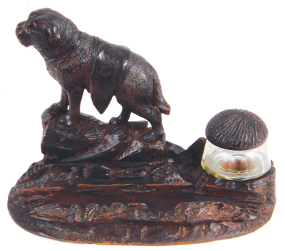 Black Forest dog pen rest woodcarving,  5.4" ht. x 7.3" w. x 4.8" d., carved in Switzerland, c.1910, linden wood, original ink bottle with cover, very good condition.