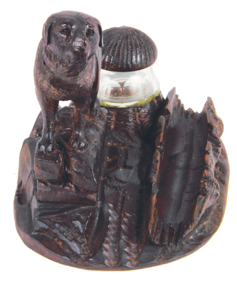 Black Forest dog pen rest woodcarving,  5.4" ht. x 7.3" w. x 4.8" d., carved in Switzerland, c.1910, linden wood, original ink bottle with cover, very good condition. - 2