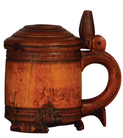 Wood tankard, 7.5'' ht., Norwegian, c.1830, carved lid, thumblift & feet, tight crack and two chips repaired.