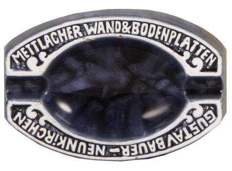 Mettlach ashtray, 7.0" x 4.8" x 1.2" ht., relief, advertisement for: Mettlacher Wand & Bodenplatten, Gustav-Bauer - Neukirchen, rare, small chip & flakes, 1" hairline on underside.