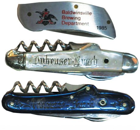 Three Anheuser Busch pocket knives, sizes 1.9" to 2.3" l., two are vintage, one from 1985, scuffs on blue, good used condition.