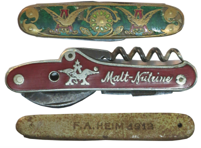 Three Anheuser Busch pocket knives, sizes 2.3" to 3.3", all three are vintage, green enamel has chipping & wear, F.A. Heim 1912 is rusted & worn, red enamel is worn & missing stanhope.