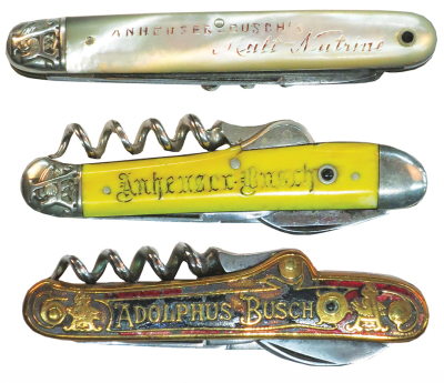 Three Anheuser Busch pocket knives, sizes 2.3" to 2.4", red enamel has chipping & wear, three stanhopes Adolphus Busch, Malt Nutrine has worn stanhope, yellow has worn stanhope & break.