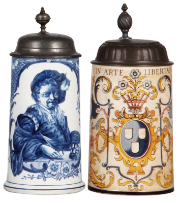 Two Mettlach steins, .5L, 5189, Delft, pewter lid, mint; with, .5L, 5013 [965], faience, pewter lid, some glaze browning, otherwise mint.