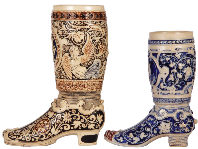 Two Character beakers, pottery, 12.4'' ht., relief, marked 600, Boot, St. George slaying dragon; with, stoneware, 10.1'' ht., relief, marked 1013C, blue saltglaze, Boot, Trumpeter of Säckingen, both mint.