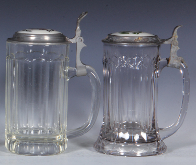 Two glass steins, .5L, pressed, porcelain inlaid lid: Old Times Monarch Brewery, pewter dent; with, .5L, pressed, porcelain inlaid lid: Willette Buffet, heavy pewter oxidation, otherwise mint. - 2