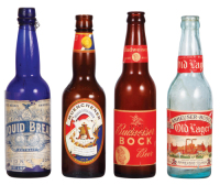 Four Anheuser-Busch bottles, 9.4" to 9.8" ht., paper labels include: Liquid Bread, Muenchener Munich Style Amber, Budweiser Bock&nbsp;Beer, Anheuser-Busch Old Lager Beer, good used condition, having minimal flaws and wear.