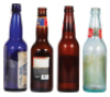 Four Anheuser-Busch bottles, 9.4" to 9.8" ht., paper labels include: Liquid Bread, Muenchener Munich Style Amber, Budweiser Bock&nbsp;Beer, Anheuser-Busch Old Lager Beer, good used condition, having minimal flaws and wear. - 3