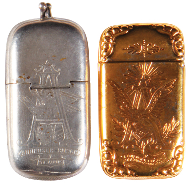 Two Anheuser-Busch match safes, 2.8'' to 3.3'' ht., double-sided design, Anheuser-Busch Brewing, St. Louis, marked: Edward J. Hauckis AUG.14.88; with, Anheuser-Busch Brewing Ass’n., St. Louis, gold color, both good condition.