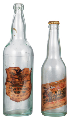 Two Saint Louis A.B.C. bottles, 11.5" ht., A.B.C. Pale Export; with, 9.6" ht., A.B.C. Beverage, paper labels, have discoloration & tears, glass good condition.