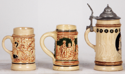 Three pottery steins, 4.0" to 6.4" ht., relief, Fairy Tale scenes, one with pewter lid, pewter repair, one has base discoloration, otherwise good condition. - 3