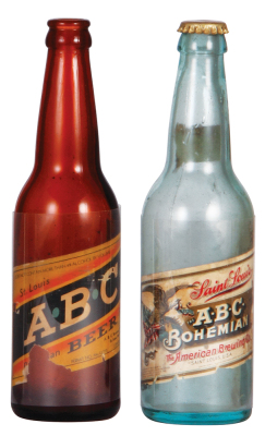 Two St. Louis A.B.C. bottles, 9.5" ht., St. Louis A.B.C. Bohemian Beer, Saint Louis A.B.C. Bohemian, one original cap, paper labels have wrinkles & tears, glass good condition.