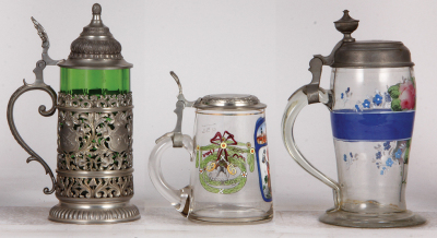 Three glass stein, .5L, blown, green, pewter overlay and lid, modern, mint; with, .5L, blown, transfer, pewter lid, cracked in rear; with, 1.0L, blown, mid 1800s, pewter lid dated 1854, crack around base is glued.  - 3