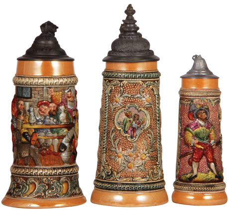 Three Diesinger steins, pottery, .5L, 67, relief; with, 1.0L, relief, lid dented & tear; with, 8.0" ht., 601, relief, old replaced lid, all have pewter lids, good condition.