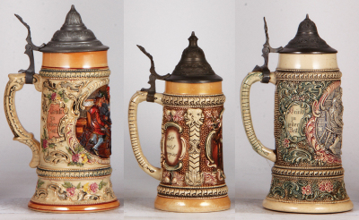 Three Diesinger steins, pottery, .5L, 40, relief, faint .5" firing line in rear; with, .5L, 624, relief; with, .5L, 40, relief, working music box in base, all have pewter lids, third has handle glued, otherwise good condition. - 3