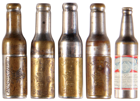 Five Anheuser-Busch bottle openers, 2.7'' to 2.9'', three with Anheuser-Busch, Anheuser-Busch Malt-Nutrine, Genuine Budweiser Lager Beer, trade marks of Anheuser-Busch, St. Louis, Mo, U.S.A., scratches and wear on wording.