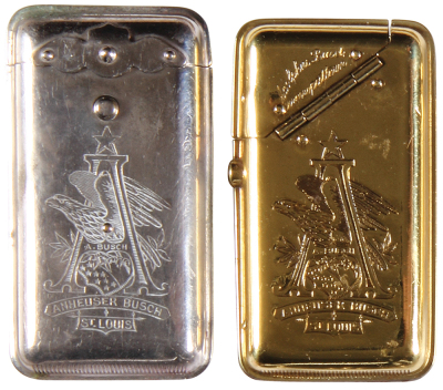 Two Anheuser-Busch match safes, 2.8'' to 3.0'' ht., double-sided design, Anheuser-Busch, St. Louis; with, Anheuser-Busch Ass’n., St. Louis, gold color, marked: Adolphus Busch, both good condition.