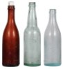 Three Anheuser-Busch bottles, 9.7'' ht., Anheuser-Busch Brewing Ass'n., Beer,&nbsp;Consumers B. B. Est B, original porcelain bottle stopper, no metal mechanism, bottle cloudy with light flaking; with, 9.6" ht., unmarked, Anheuser-Busch; with 8.6" ht., unmarked - 2