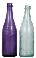 Two Anheuser-Busch bottles, 9.3", marked S. B. & G. Co., purple color, Anheuser-Busch Brew Ass'n. with A & Eagle logo, Washington D.C., Registered 95 around base edge; with, Anheuser-Busch Brewing Ass'n., 9.0" ht., marked A. B. Co. 1083 7, Norfolk, VA Bra
