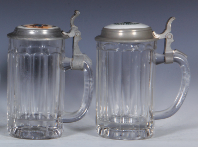 Two glass steins, .5L, pressed, porcelain inlaid lid: McAvoy's Kloster-Bräu Alma Mater, roughness around lower body; with, .5L, pressed, porcelain inlaid lid: College Inn, mint. - 2