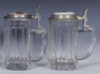 Two glass steins, .5L, pressed, porcelain inlaid lid: McAvoy's Kloster-Br&auml;u Alma Mater, roughness around lower body; with, .5L, pressed, porcelain inlaid lid: College Inn, mint. - 2