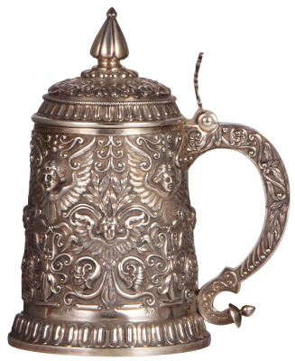 Russian silver stein, 8.8'' ht., 720 grams, hall mark 84 and 1894, dated 1898, hand-chased faces and leaves, very good condition.            