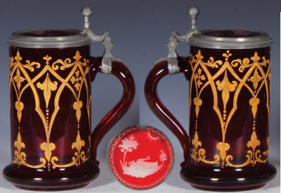 Two glass steins, .5L, both c1840, blown, clear, red stain, hand-painted, gilding, matching glass inlaid lid; with, .5L, blown, clear, faceted, red staining, engraved, Dresden, matching glass inlaid lid, both mint. - 2