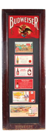 Anheuser-Busch cabinet door, lithographs, 37.4" x 13.5", wood frame with glass, Budweiser on the bottom, dark matting, 7.0" ht., Budweiser lithograph, six Anheuser-Busch advertising signs for various products, wood frame was heavily used with chips & wear