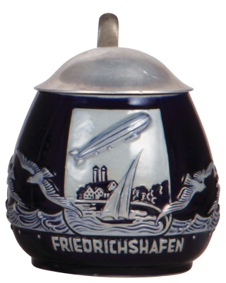 Stoneware stein, .5L, relief, marked Wick-Werke, 7244, Friedrichshafen, aluminum lid: marked Zeppelin, lid is the same material used to build the airship, small chip on underside.