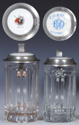 Two glass steins, .5L, pressed, porcelain inlaid lid: McTague's, old good pewter repair; with, .5L, pressed, porcelain inlaid lid: E.O. Rank, IIII Grand Ave., small base chip.