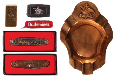 Six Anheuser-Busch items, 2'' to 6.4'' Anheuser- Busch 12k G.F. money clip; two pocket knives, double-sided design, Budweiser, Clydesdale horses and soldiers, The World’s Famous Eight Horse Hitch, Budweiser Clydesdales; A & Eagle pocket knife; Budweiser p