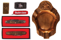Six Anheuser-Busch items, 2'' to 6.4'' Anheuser- Busch 12k G.F. money clip; two pocket knives, double-sided design, Budweiser, Clydesdale horses and soldiers, The World&rsquo;s Famous Eight Horse Hitch, Budweiser Clydesdales; A & Eagle pocket knife; Budweiser p