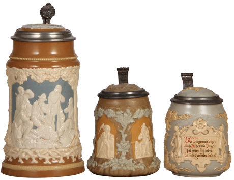 Three Mettlach steins, 1.0L, 812, relief, inlaid lid, mint; .5L, 1467, relief, inlaid lid, mint; .5L, 1370, inliad lid, mint.