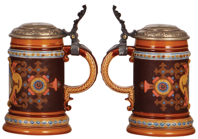 Three Mettlach steins, 1.0L, etched, 1527, .5" shallow chip on underside of base; .5L, etched, 2382, inlaid lid, lid has cracks; .5L, etched, 1454, original silver-plated lid, tight hairline visible inside near base. - 4