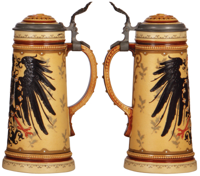 Two Mettlach steins, 1.0L, 2382, etched, inlaid lid, faint short glaze line visible inside the inlay; with, 1.0L, 2204, decorated relief, inlaid lid, .5" shallow chip at upper area of the body. - 3