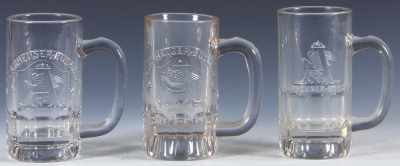 Three Pre-Prohibition embossed beer glass mugs, 5.1'' to 5.4'' ht., two are Anheuser-Busch A & Eagle, one is A & Eagle, one has chips in center of glass, otherwise excellent condition.