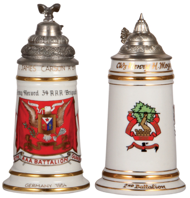 Two U.S. Military steins, .5L, porcelain, Best Firing Record 34 AAA Brigade 1953, Germany 1954, pewter lid, lithophane line, otherwise mint; with, 2nd. Battalion, 1st. Air Defense Artillery, Germany, pewter lid, mint.