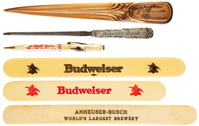 Five Anheuser-Busch items, 10.4'' to 5.4'', letter opener, Anheuser-Busch, With Good Wishes of J. J. Carroll; letter opener, Anheuser-Busch, Malt-Nutrine; pen, Anheuser-Busch, Budweiser; three foam scrappers, trademarks of Anheuser-Busch, Budweiser, World