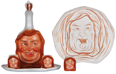 Porcelain Character bottle, 8.0'' ht., marked: E. Bohne Sšhne, Monk, with face on tray & three schnapps cups, all excellent condition.