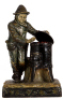 Terra cotta figurine lamp, 17.4'' ht., marked 6086, J.M., Macaroni [chestnut roasting] signed Aug. 1907, small chip, otherwise very good condition.&Ecirc; &Ecirc;&Ecirc;100-300