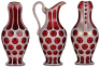 Cranberry glass pitcher set, white on ruby overlay, gilded, late 1800s, European, pitcher, 10.5'' ht., tray, 10.0'' d., two beakers, .25L, small chip on edge of tray, pitcher & beakers in excellent condition.&Ecirc; &Ecirc; - 2