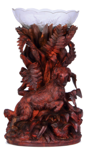 Black Forest wood carving, 15.5'' x 10.5'' x 9.5'', with glass bowl, 17.2'', carved in Brienz, Switzerland, c.1900, Dog walking through foliage over hidden bird, glass bowl has etching, chips and leaves repaired.&nbsp;&nbsp;