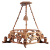 Black Forest ceiling chandelier, 34.0" diameter, 27.5" ht., linden wood, seven lamps, mid 1900s, was hanging in Hans' Bavarian Lodge Wheeling, IL,&Ecirc;color photocopy of restaurant brochure included with the lamp, good condition. - 2