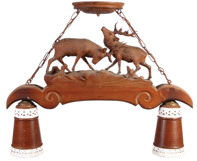 Black Forest ceiling lamp fixture, 26.0" x 21.5",Êlinden wood, two lamps, mid 1900s, was hanging in the bar at Hans' Bavarian Lodge Wheeling, IL,Êcolor photocopy of restaurant brochure included with the lamp, stags have breaks repaired and antler chips, d